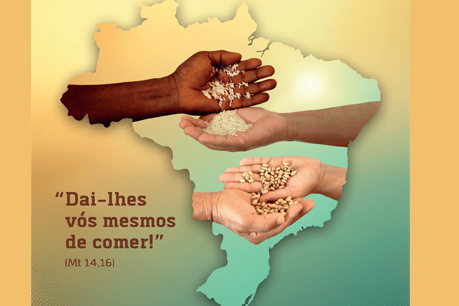 #PraCegoVer: foto mostra o cartaz da Campanha da Fraternidade. É um mapa do Brasil com mãos segurando grãos de arroz e de feijão. Ao lado está escrito o lema da campanha: Dai-lhes vós mesmos de comer".
